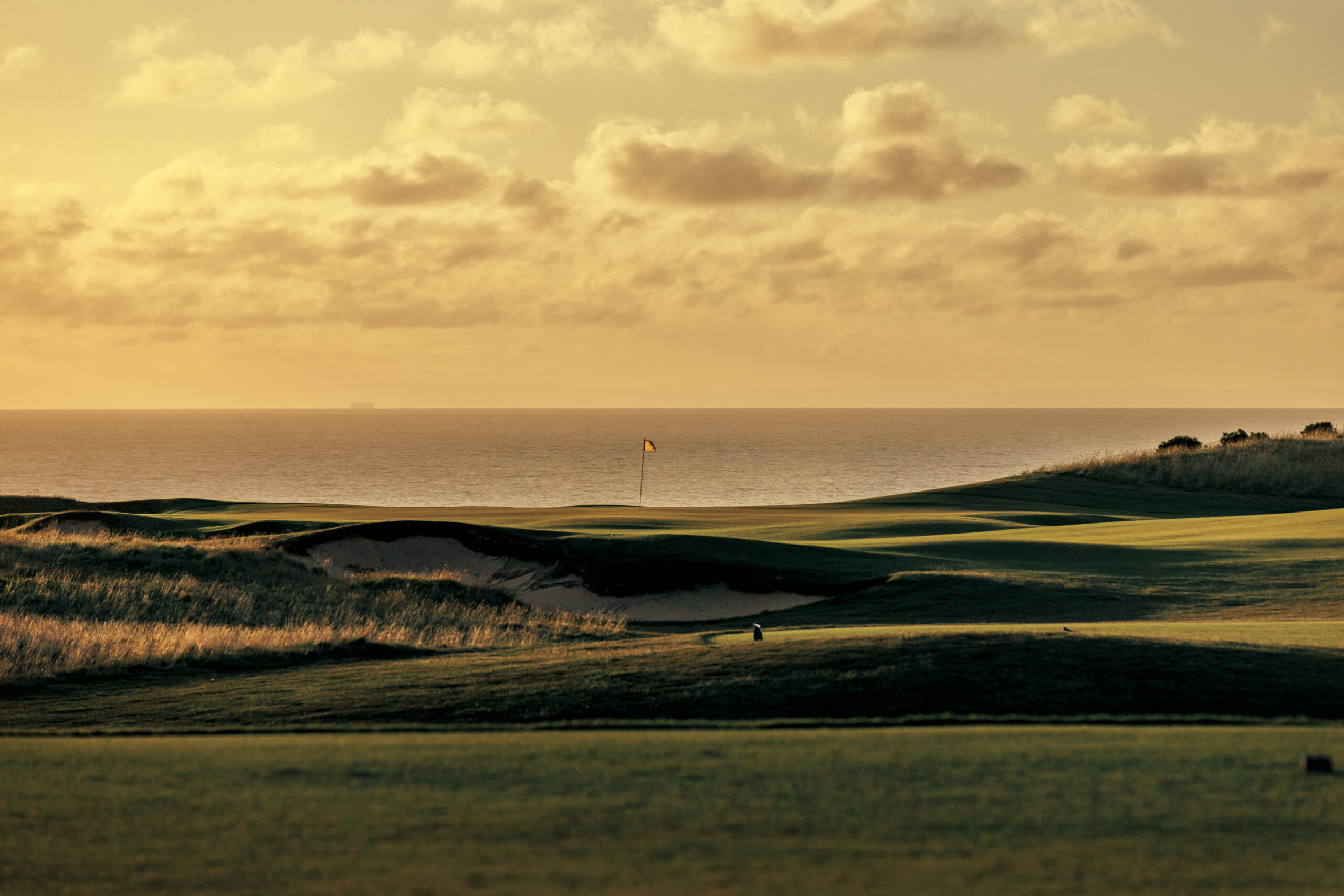 Aerial view of green and bunker